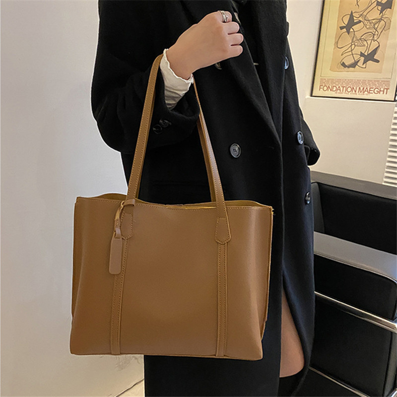Classic Black Faux Leather Tot - огляд і ціна Leather Work Bag